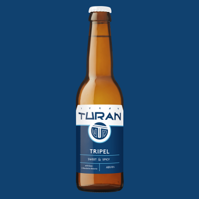 Birra Tuan: Tripel- a bottiglia dall'etichetta blu, rappresentata su uno sfondo blu